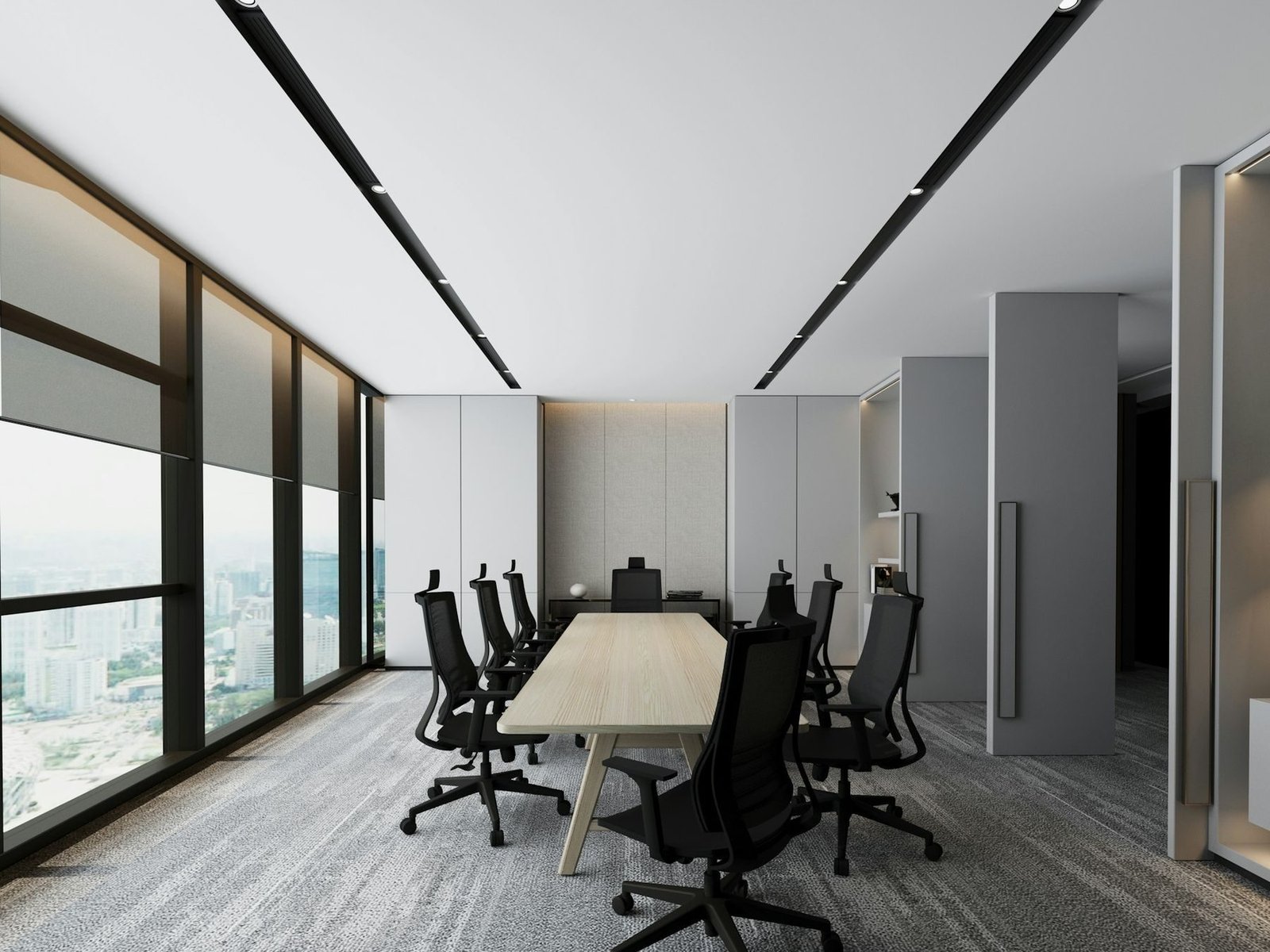 A bright, empty conference room high above the city.